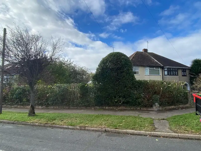 Cutting back a hedge that had taken over the pavement, Hassocks (photo 2 of 2)
