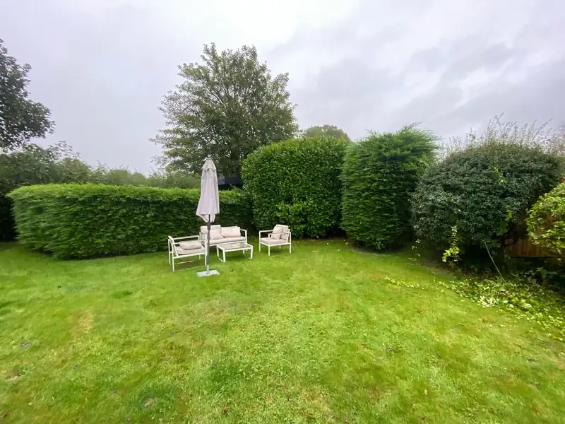 Trimming garden hedges back into shape, Lindfield (photo 1 of 2)