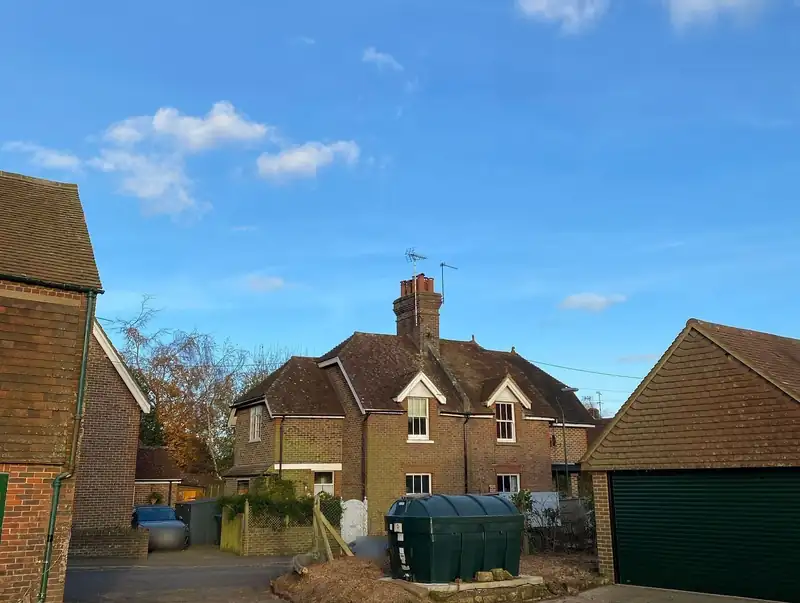 Removing a large macrocarpa over a road and house, Cuckfield (photo 3 of 6)